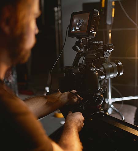 someone recording using a cameras in a studio